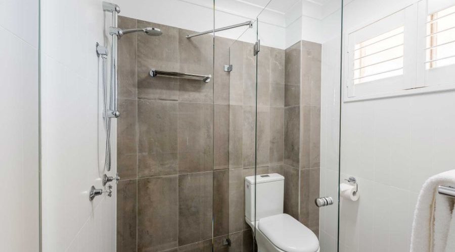 Elegant bathroom with walk-in shower and free amenities/toiletries